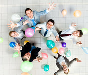 joyful-business-people-with-balloon