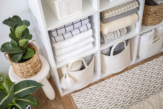 neatly-folded-linens-on-shelves