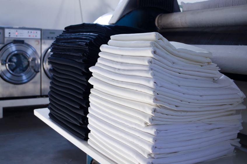 stack-of-folded-black-and-white-cloths