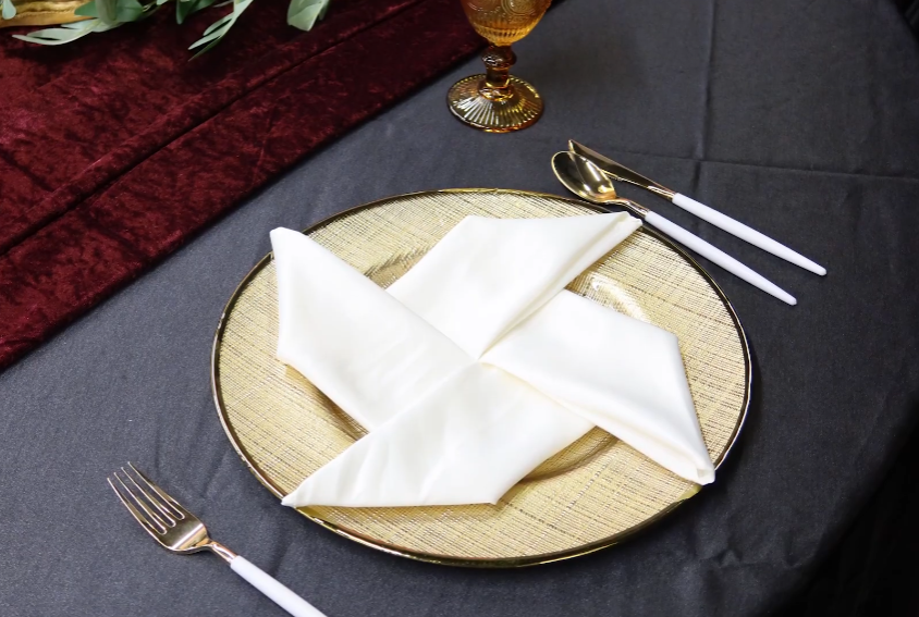 white-pinwheel-napkin-fold
