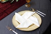 white-pinwheel-napkin-fold