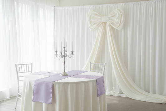 white giant fabric bow setup