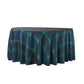 Round table draped with a green and blue plaid tablecloth with red and white lines in a tartan pattern.