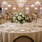 hotel wedding reception with 132" Round Premium Linen-Look Panama Weave Tablecloth - Ivory