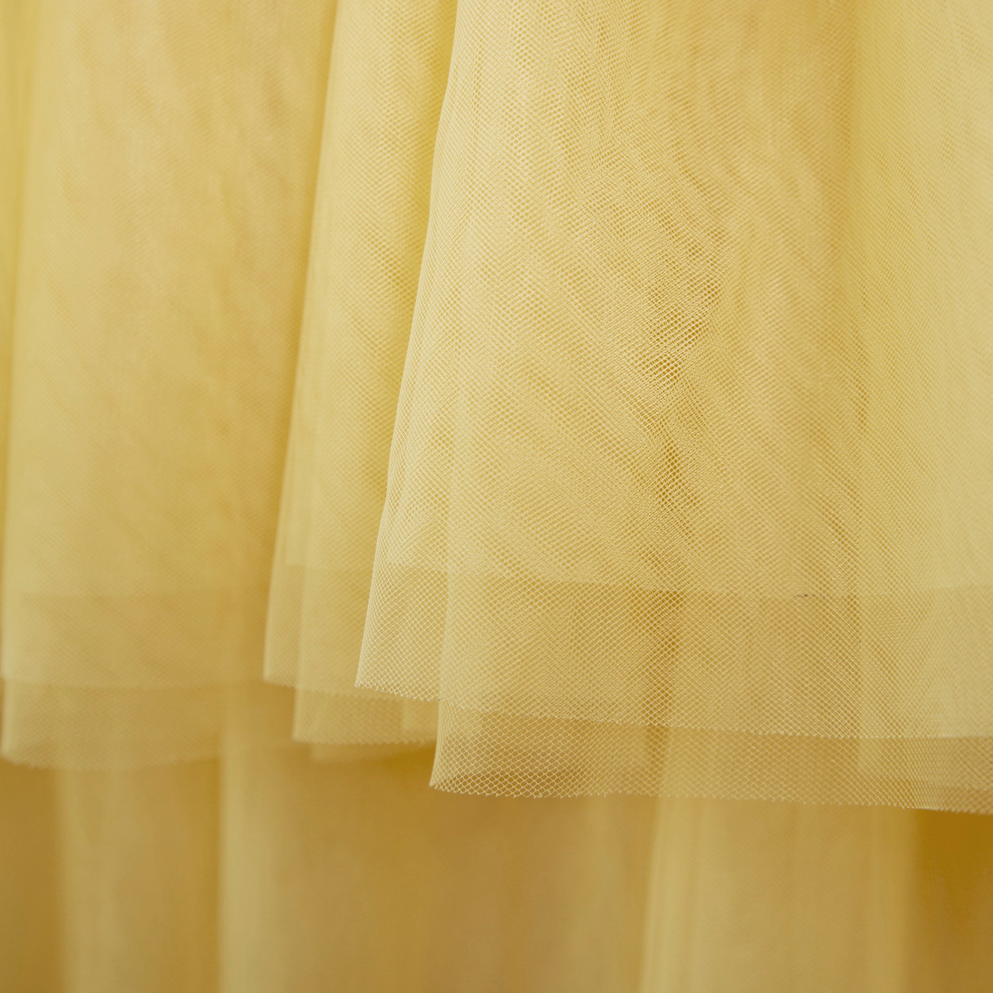Ruffled layered tulle mustard gold fabric