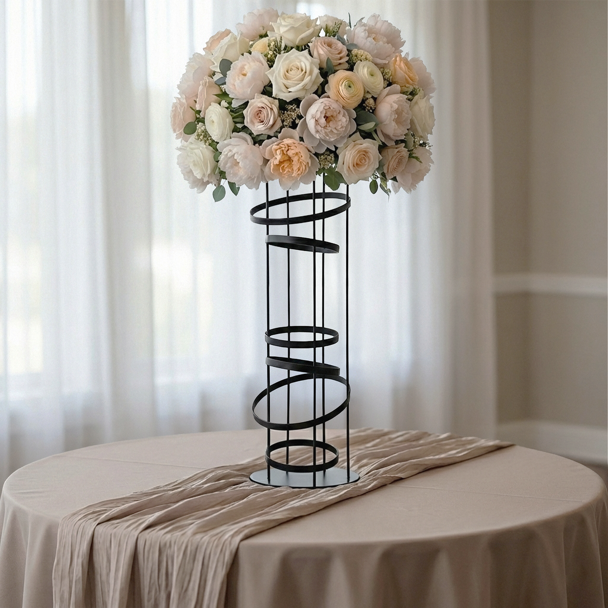 2pcs/set Modern Black Spiral Table Centerpiece on top of blush/rose gold tablecloth and faux florals on top of the centerpiece
