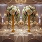 Set of 2 Metal Trumpet Centerpiece Vases Gold table setting with charger plates, wine goblets and florals