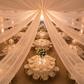 indoor top view draping setup for wedding reception with 30ft Ceiling/Curtain Draping Sheer Voile Flame Retardant (FR)  - Ivory