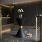 Black and Gold event using the 38" Tall Hourglass Plinth Pedestal Stand Black paired with a vase of lilies and wine goblets