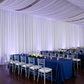 intimate gala night dinner table with 40ft Ceiling/Curtain Draping Sheer Voile Flame Retardant (FR)  - White