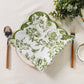 4 pcs/pk French Toile 20"x20" Scalloped Edge Napkins Olive Green folded on top a white gold trimmed dinner plate