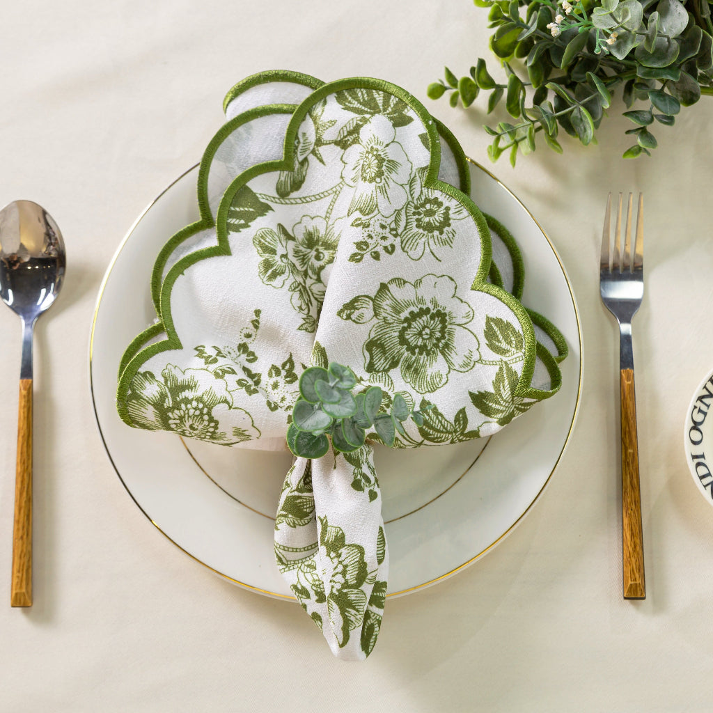 French Toile 20"x20" Scalloped Edge Napkins Olive Green with a eucalyptus napkin ring