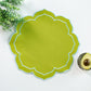 4pc/set Petal Elegance Placemats - Matcha/Turquoise Trim paired with a white tablecloth, and faux greenery