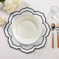 4pc/set Petal Elegance Placemats - White/Black Trim paired with a white dinner plate, white roses, water glass and silverware