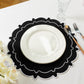 4pc/set Signature Scallop Placemats Black/White with white dinner plate, silverware, wine goblet and florals