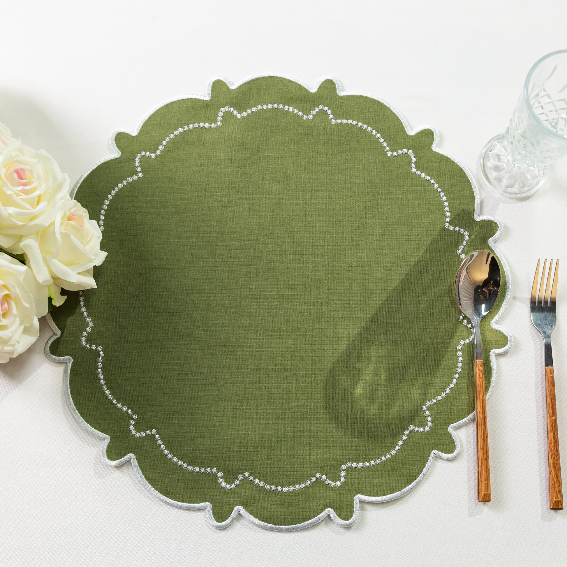 4pc/set Signature Scallop Placemats Olive Green/White with silverware, wine goblet and florals