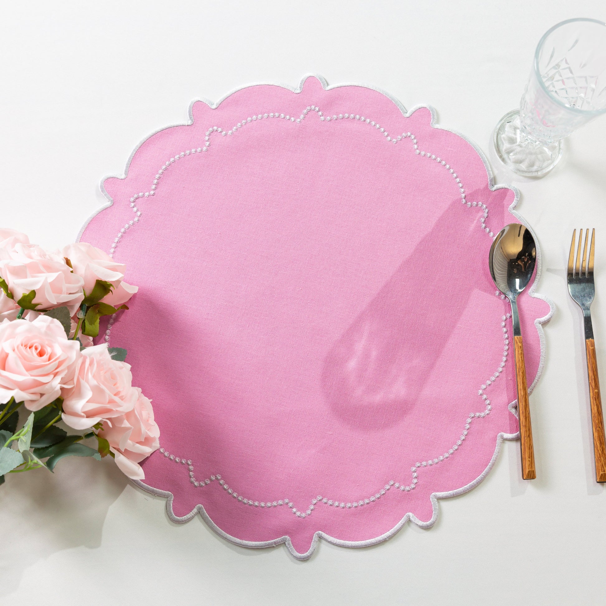 4pc/set Signature Scallop Placemats Pink/White Trim with pink roses, and silverware
