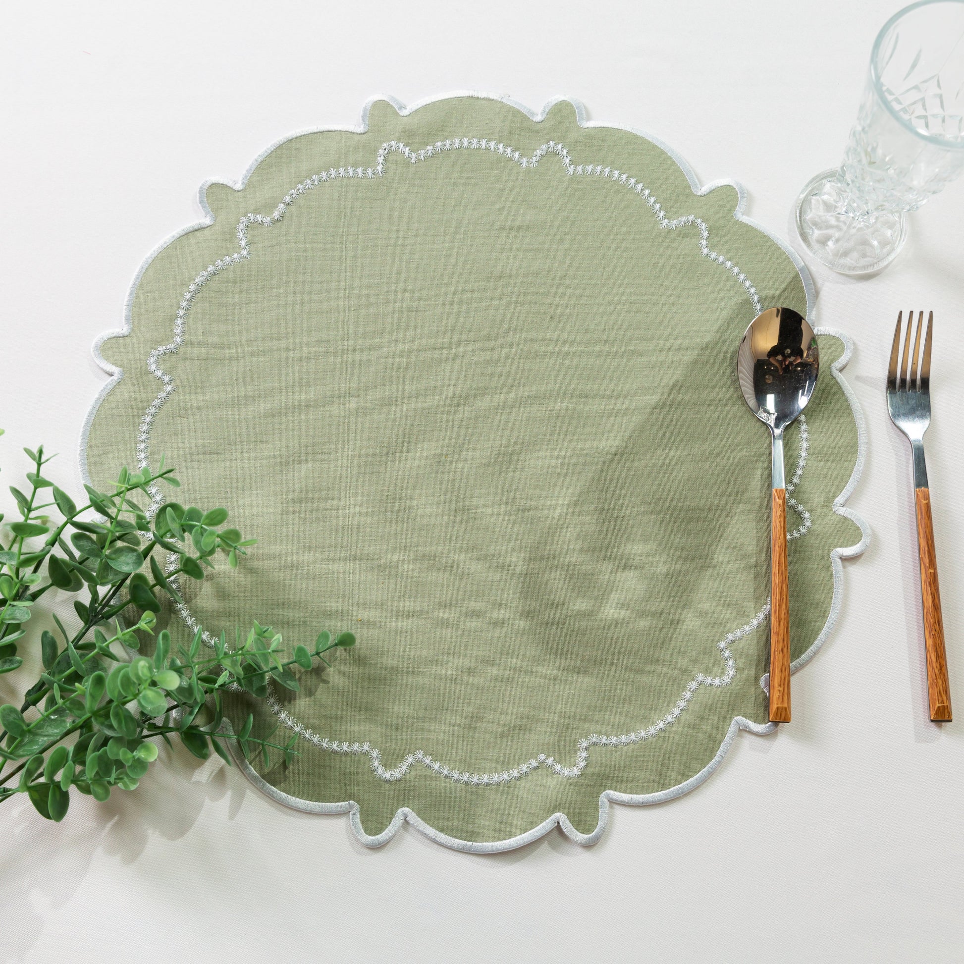 4pc/set Signature Scallop Placemats Sage Green/White Trim with faux greenery and silverware
