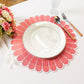 4pc/set Sunburst Edge Placemats Coral/White Trim paired with white dinner plate, florals, silverware on a white tablecloth
