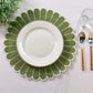 4pc/set Sunburst Edge Placemats Olive Green/White Trim paired with white dinner plate, faux greenery, silverware on a white tablecloth