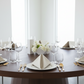 minimalist corporate setup with 5 pcs/pk Premium Linen-Look Panama Weave 20"x20" Napkin - Beige