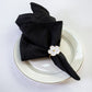 5 pcs/pk Embossed Geometric Jacquard Napkin 20"x20" Black fan fold with a white flower napkin ring