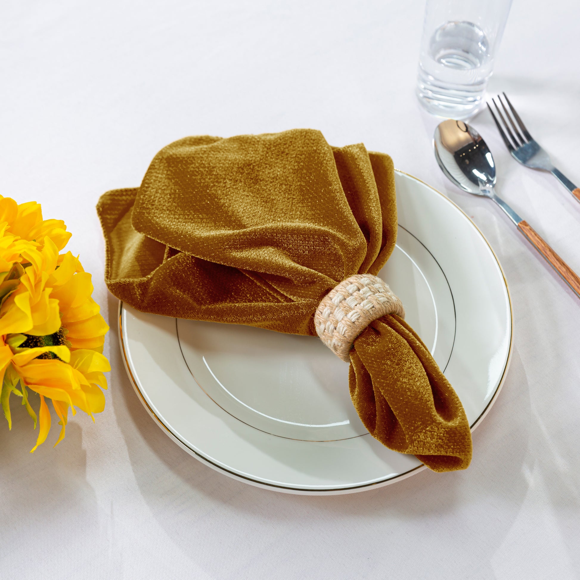 5 pcs/pk Glitter Velvet 20"x20" Linen Napkin Gold paired with a burlap napkin ring, white charger plate, sunflowers and silverware