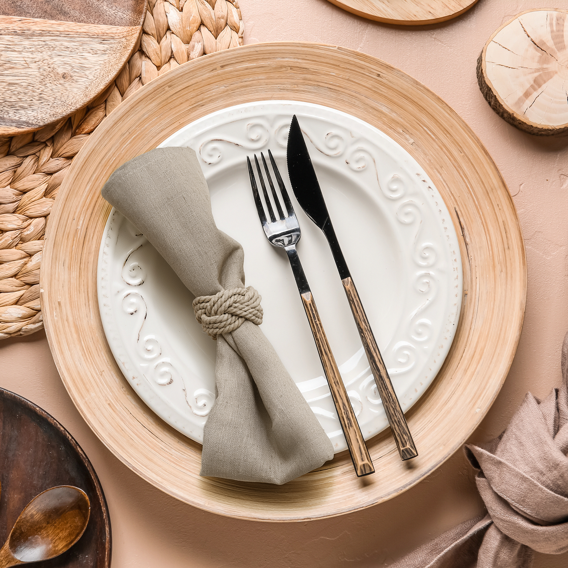 5pcs/pk Premium Linen Look Panama Weave Beige with a white dinner plate on top of a neutral charger plate and silverware