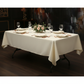 60"x120" Rectangular Premium Polyester Tablecloth - Light Ivory/Off White with white dinner plate | white napkin | wine goblets