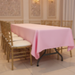 60"x120" Rectangular Premium Polyester Tablecloth - Pink with gold chiavari chair on a plain setup