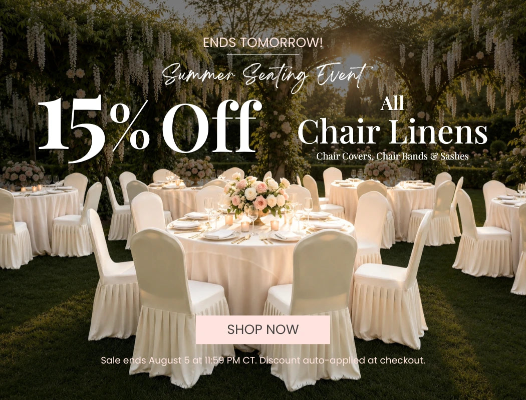Outdoor wedding reception with white chair covers on round tables; floral centerpieces; 15% Off All Chair Linens.