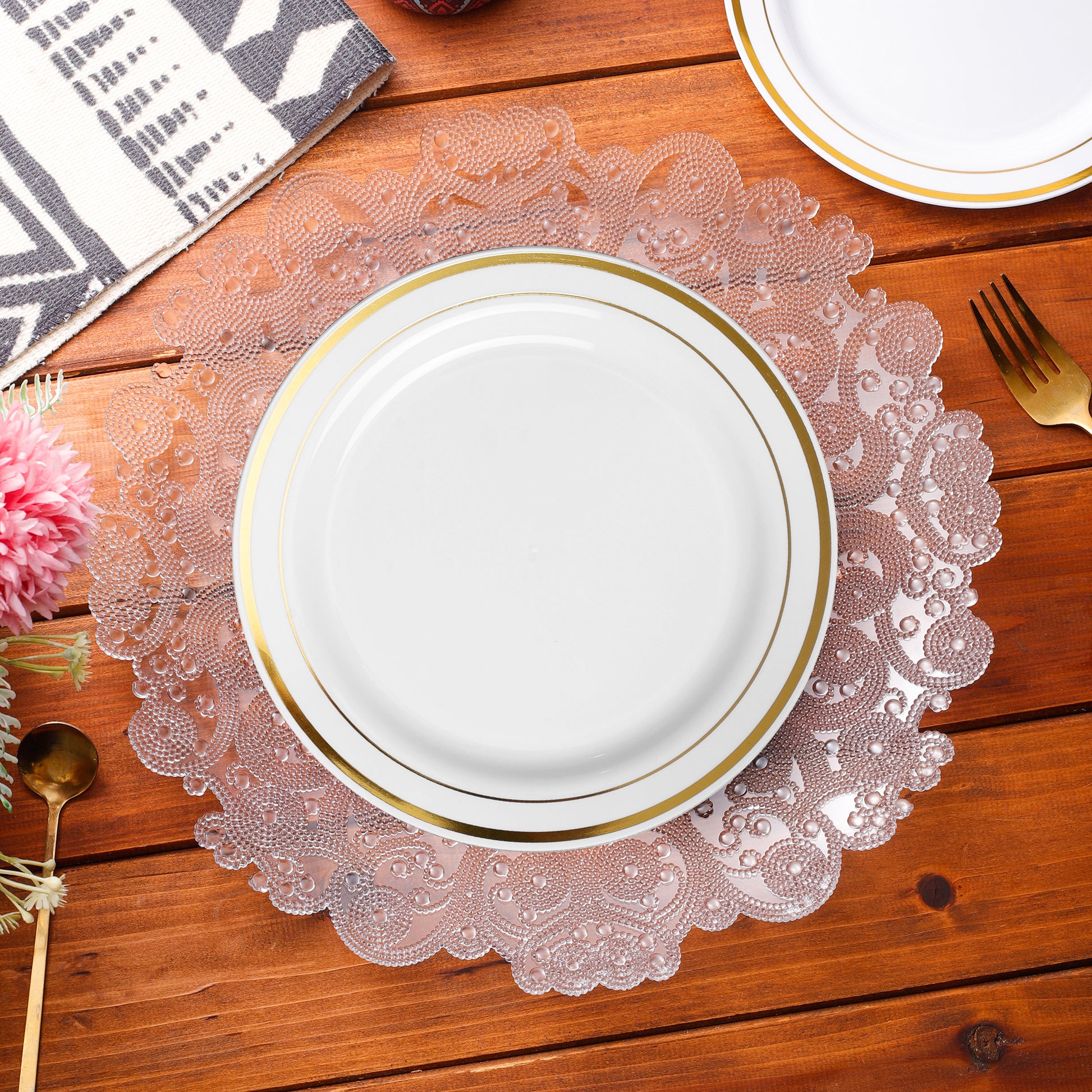 8 pc/set Filigree Acrylic Charger Plate Clear with a white gold trimmed charger on top