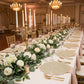 reception with the 8 pc/set Filigree Acrylic Charger Plate Gold on banquet tables with gold chiavari chairs, gold flatware, candelabras and floral greenery table runner 