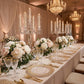 8 pc/set Greek Key Acrylic Charger Plate Clear Gold Trim on a rectangular table with gold flatware, wine glass an candelabra centerpieces