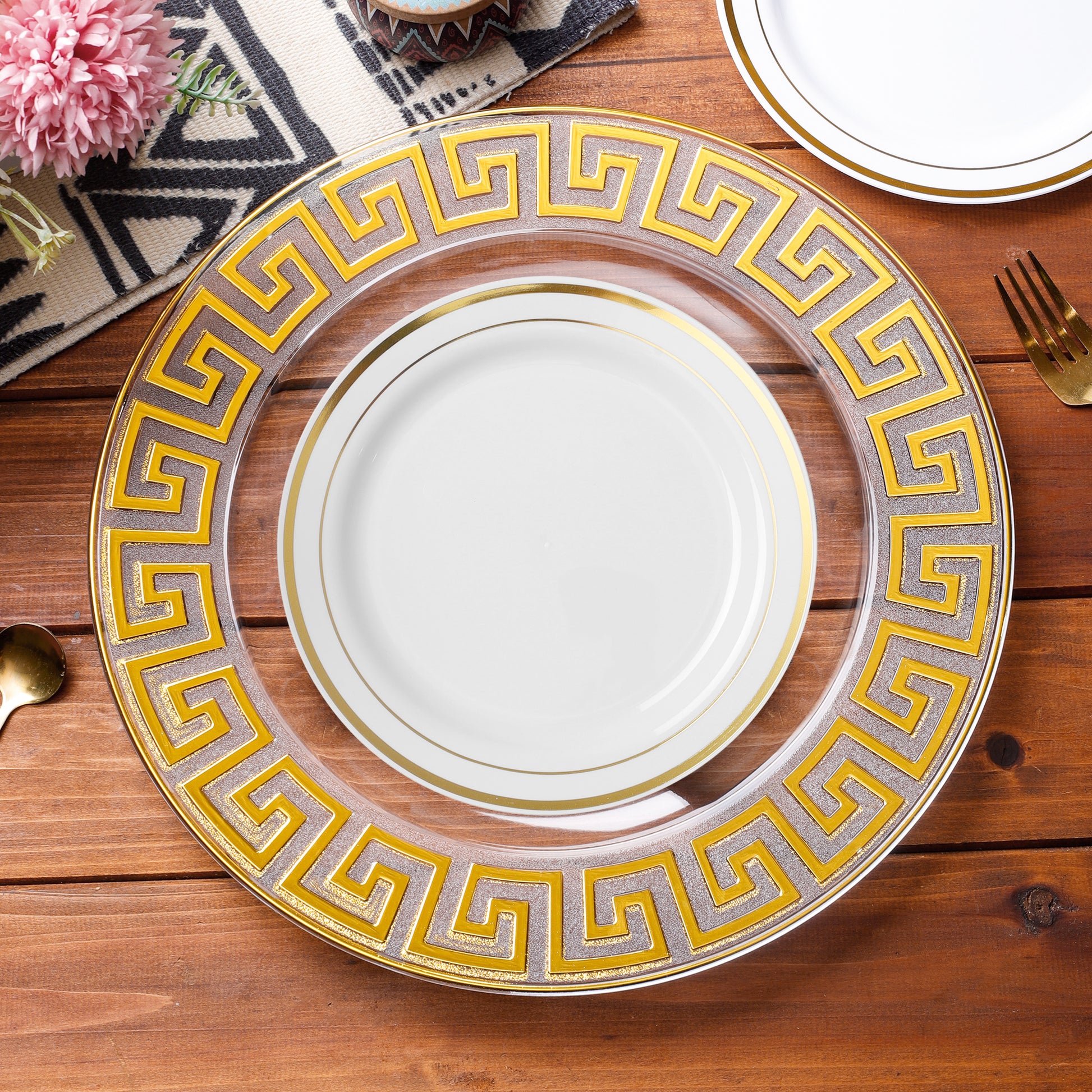 8 pc/set Greek Key Acrylic Charger Plate Clear Gold Trim with a white gold trim dinner plate on top