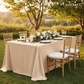 90"x132" Rectangular Oblong Premium Polyester Tablecloth - Champagne with Chiavari Gold Chairs.
