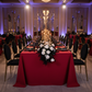 corporate dinner setup with 90"x156" Rectangular Oblong Premium Polyester Tablecloth - Apple Red
