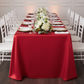 90"x156" Rectangular Satin Tablecloth - Red with gold charger plate | white dinner plate | white napkin | white chiavari chair | premade floral runner 