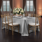 90"x156" Rectangular Satin Tablecloth - Silver with silver charger plate | white dinner plate | wine goblets | gold chiavari chairs