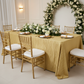 Accordion Crinkle Taffeta 90"x132" Rectangular Tablecloth - Gold with gold charger plate | white napkin | gold chiavari chair | flower premade runner | wine goblets