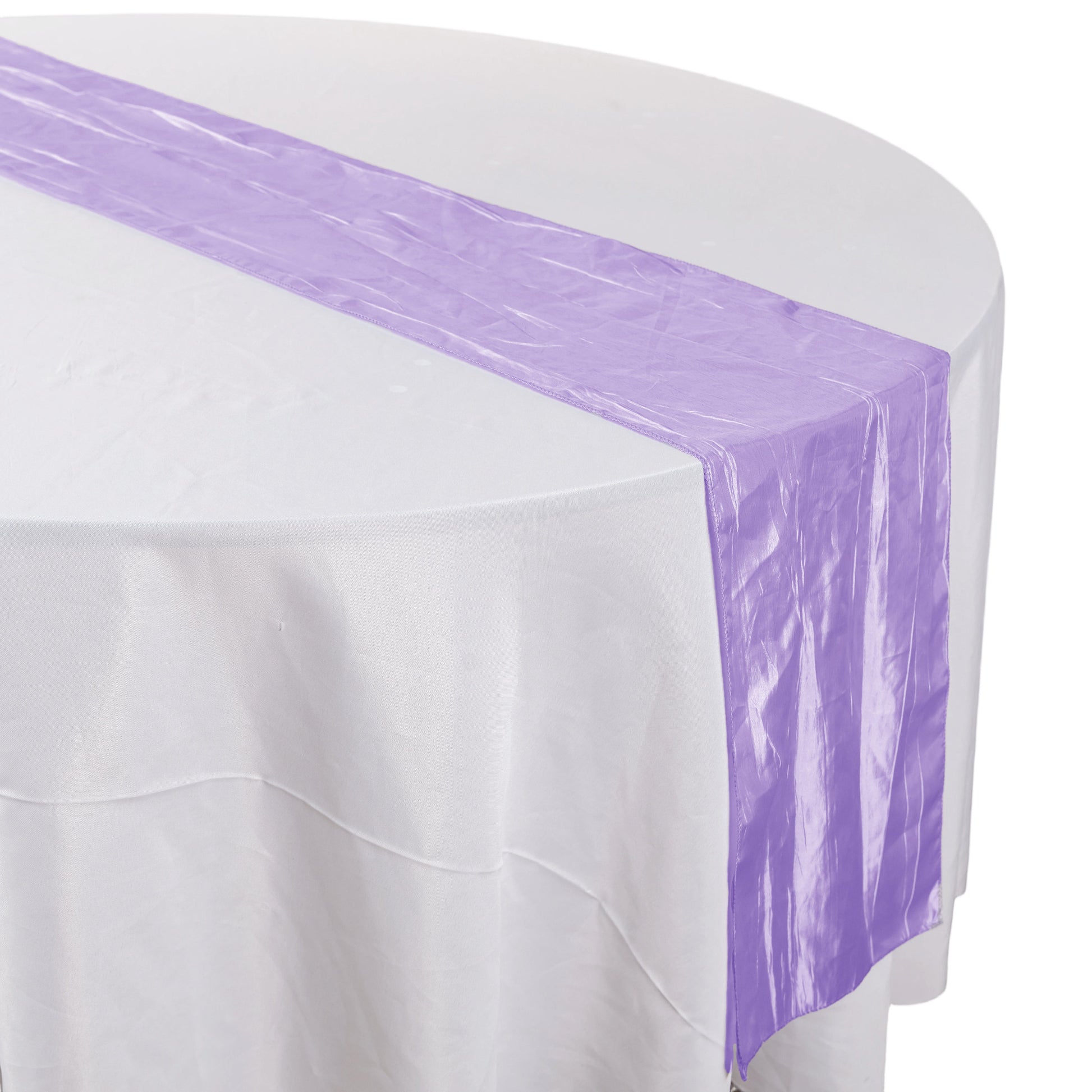 angled view Accordion Crinkle Taffeta Table Runner Lavender on top a white tablecloth