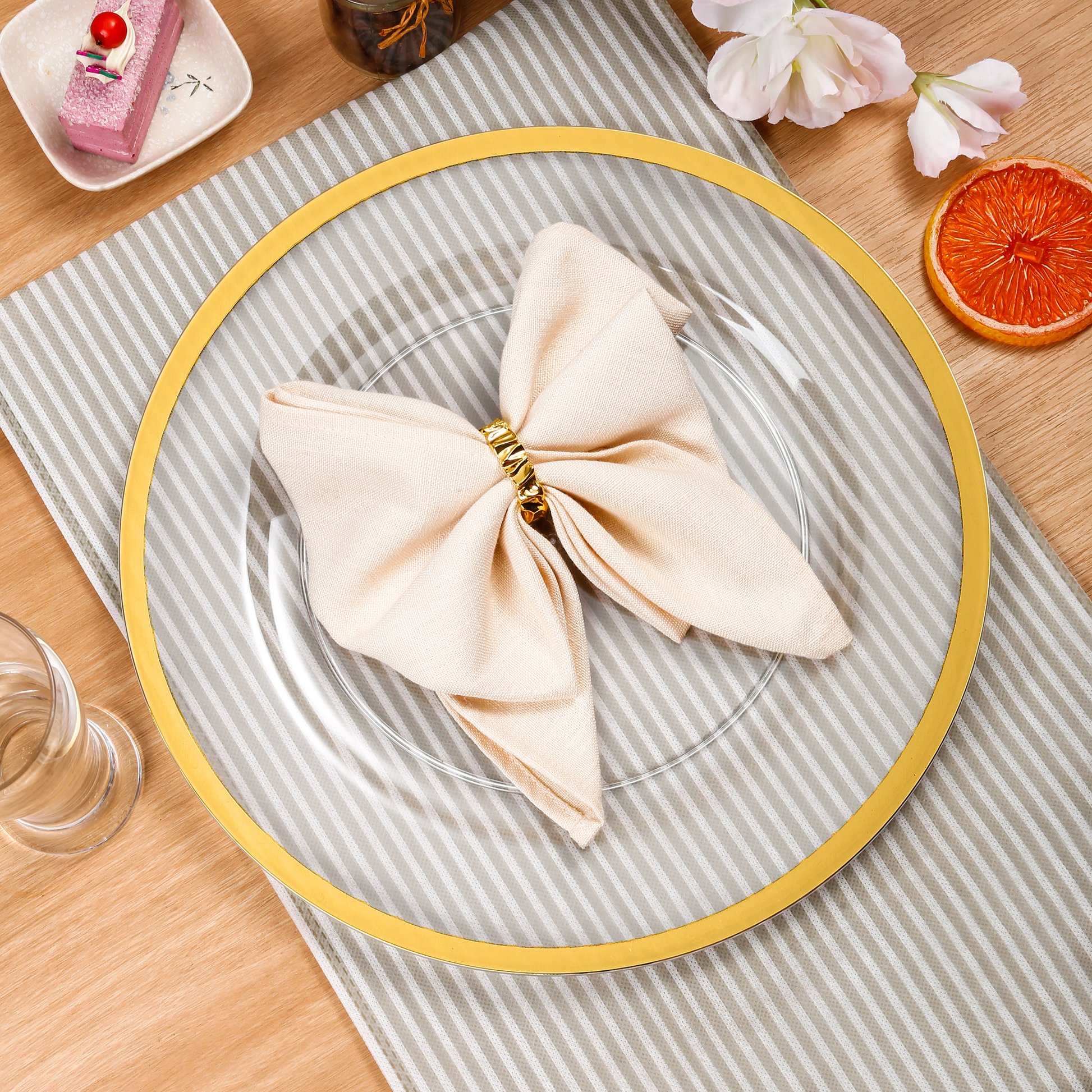 detail view of Alpine Acrylic Charger Plate - Gold trim