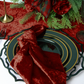 Velvet apple red table runner pared with the apple red velvet napkin green charger and christmas centerpiece