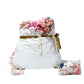 Artificial 3D Floral for Butterfly Backdrop Stand Pink rolled up along with the extra florals and glue gun