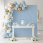 8ft x 8ft Striped Spandex Slip-on Backdrop Cover Baby Blue for Baby Shower with Balloon Garland in front of a dessert table