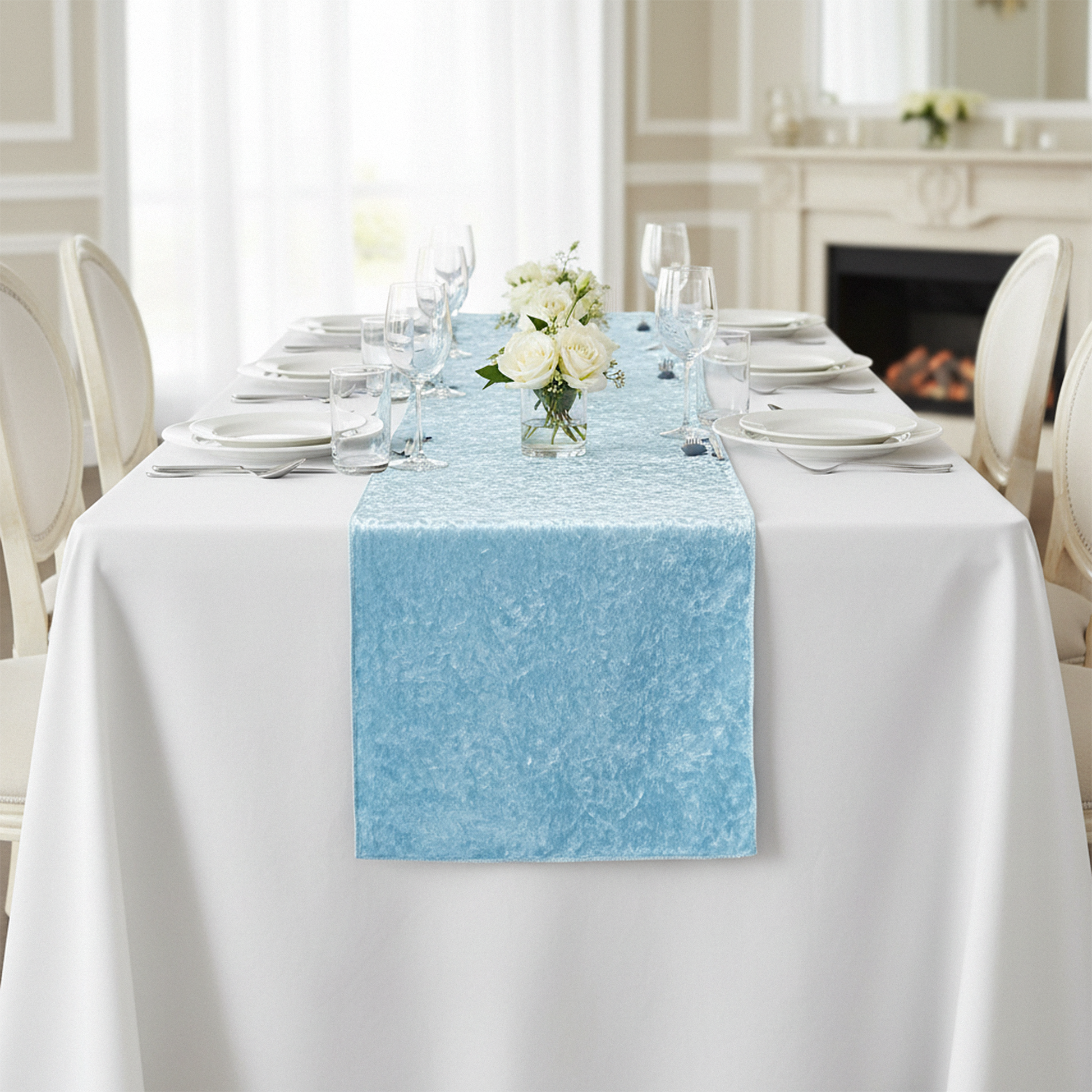 Velvet Table Runner Baby Blue on a white rectangular tablecloth with water goblets and white dinner plates