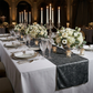 Velvet Table Runner Charcoal wedding table setup with candelabras, floral centerpieces and silver charge plates