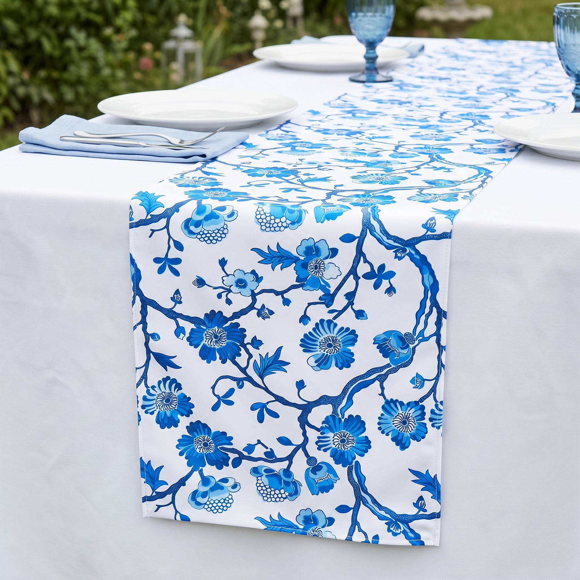 Chinoiserie Floral Scuba Table Runner - Blue -Closeup Garden setting