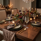 Velvet Table Runner Chocolate on top a natural wood table with brown napkins and gold napkin ring