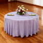 Crinkle Shimmer 132" Round Tablecloth Lavender table setup with floral centerpiece, gold charger plates and ivory napkins